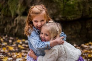 energetic children hugging